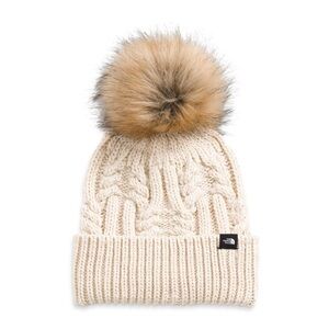 The North Face youth faux fur cable knit beanie.